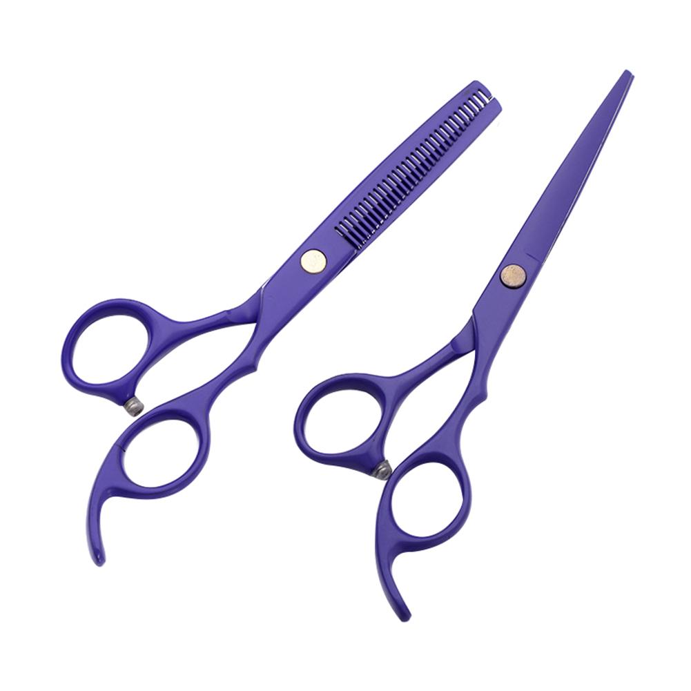Professional hairstylist using ergonomic hair scissors in a New York salon